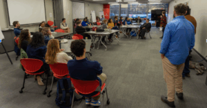 In April, UW-Madison Odyssey Project and Madison Commons cohosted a community event to discuss a call to action for a family scholar house in Madison. This housing would support student parent families. Photo by Jonás Tijerino.